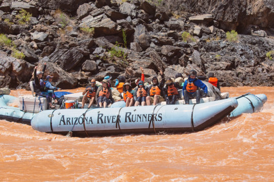 Motor boat in rapid.