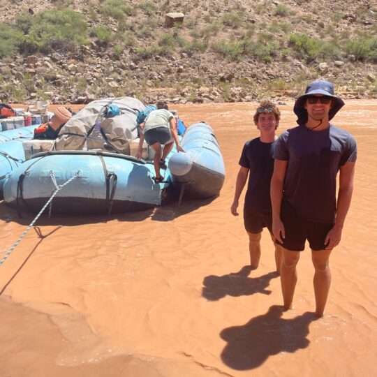 Emlen, left, and Henry, cooling off in the Colorado River.