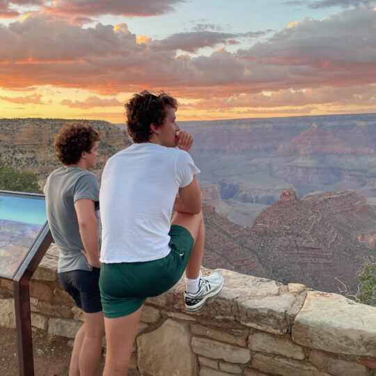 Emlen and Henry seeing the view from the top of the grand Canyon before their river trip. 