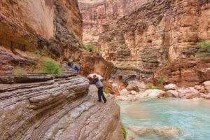 People hiking at Havasu Creek.