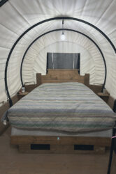 Inside a covered wagon at Bar 10 Ranch.