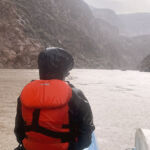 Person in rain jacket in the rain