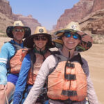 People in hot weather wearing hats