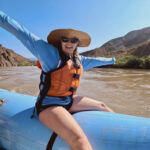 Woman happy with her arms in the air