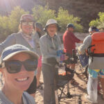 Group smiling in the Grand Canyon.